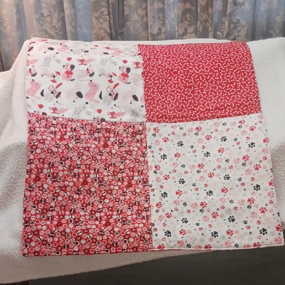 Patchwork Quilt with Red and White Patterns